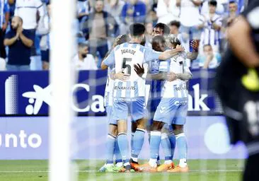 Clasificaciones de jugadores de real sporting contra málaga cf